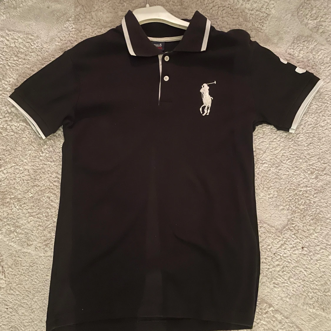 Svart pikétröja från Ralph Lauren