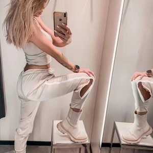 Byxor med dragkedja - Byxor med dragkedjor på sidorna helt nya