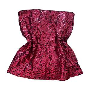 En glittertopp, eller kjol beroende på hur man vill ha den! Aldrig använd