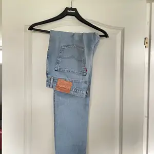 Blåa Levi’s baggy jeans. ”512” W34 L32