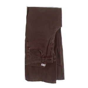 Bruna baggy jeans - Mellan baggy/straight fit jeans, storlek 38, sparsamt använda, (små hål i den inre resåren som inte syns utåt, har haft snören i för att minska midjan) 
