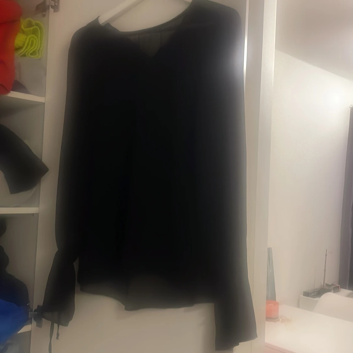 Genomskinlig svart topp 