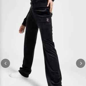 Juicy Couture - Svarta juicy couture byxor