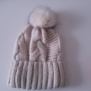 Mössa -  man kan stretcha ut mössan 