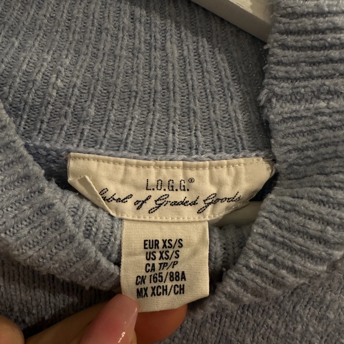 Ljusblå stickad - 90