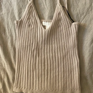 Beiget linne från HM - Säljer detta jätte söta linnet från H&M i stolek S. I nyskick!