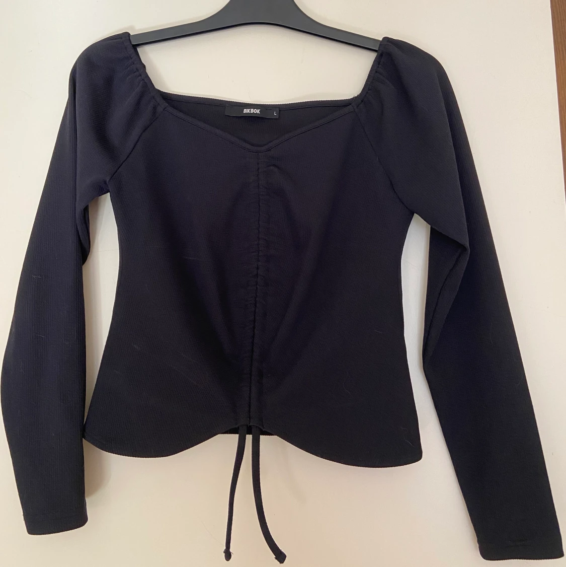 Långärmad offshoulder topp