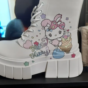 Ankle boots hello kitty - Ankle boots with hello kitty design on the side with zipper -Size 39 -New and never worn ( also available on my other app im selling it on vinted, here is the link:  https://www.vinted.se/women/shoes/boots/platform-boots/2301154291-hello-kitty-ankle-boots