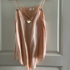 Topp  - Ljusrosa topp  Frakt tillkommmer 