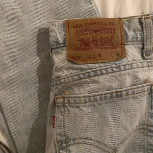 Levis jeans  - Ljusblåa Levis jeans. 