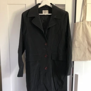 Unik kappa - Kappa i regntätt vinylmaterial. Väldigt speciell!