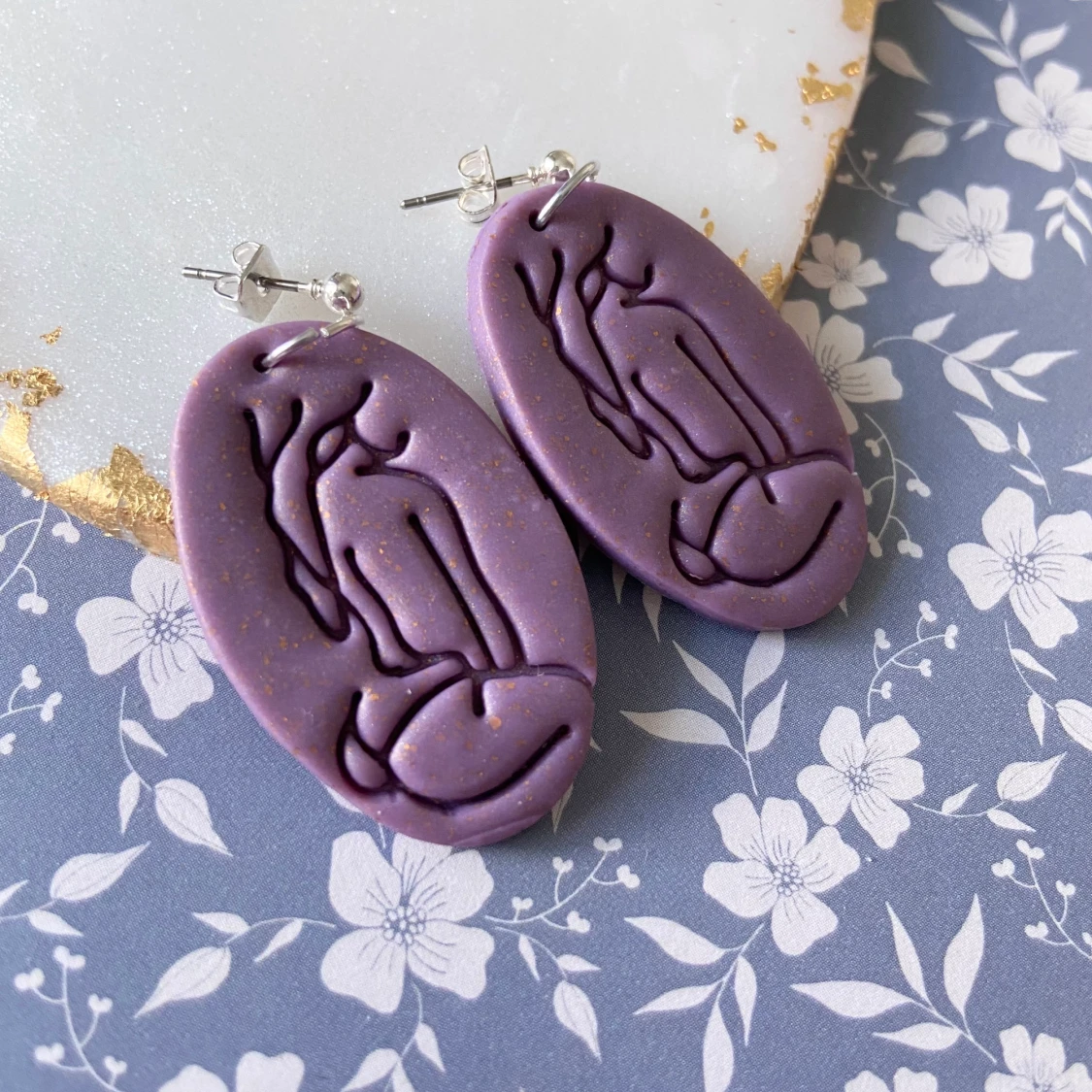 Örhängen av lera  - 90