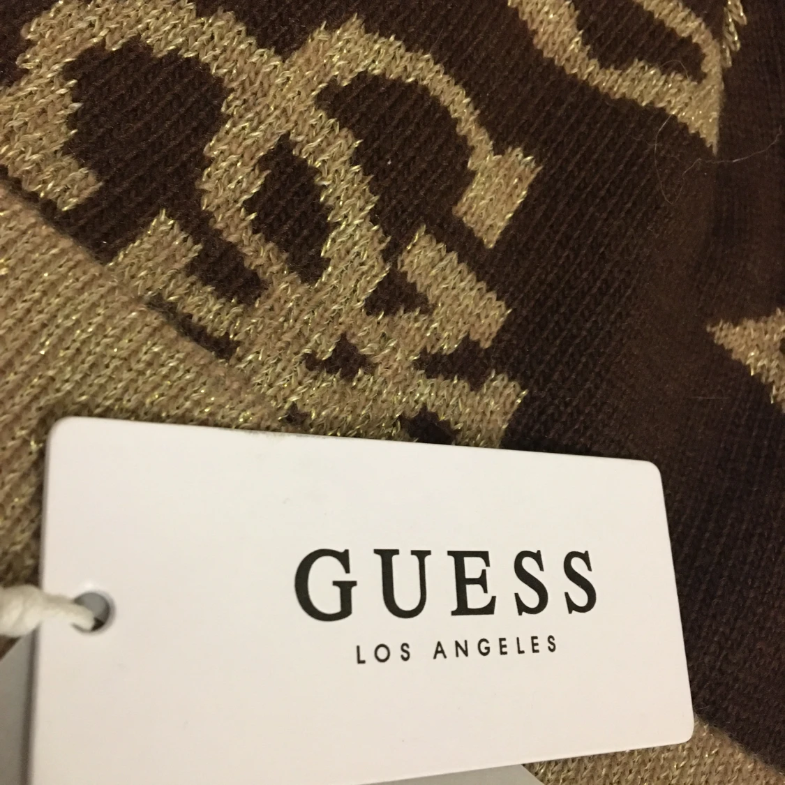 Guess  - 91