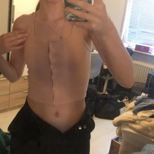 Topp - Gullig ljusrosa topp. Storlek XS men passar även S