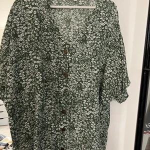 Klänning - Oklart märke, köpt utomlands. Oanvänd.