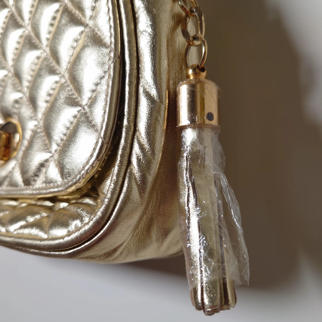 Liten guldväska - 90