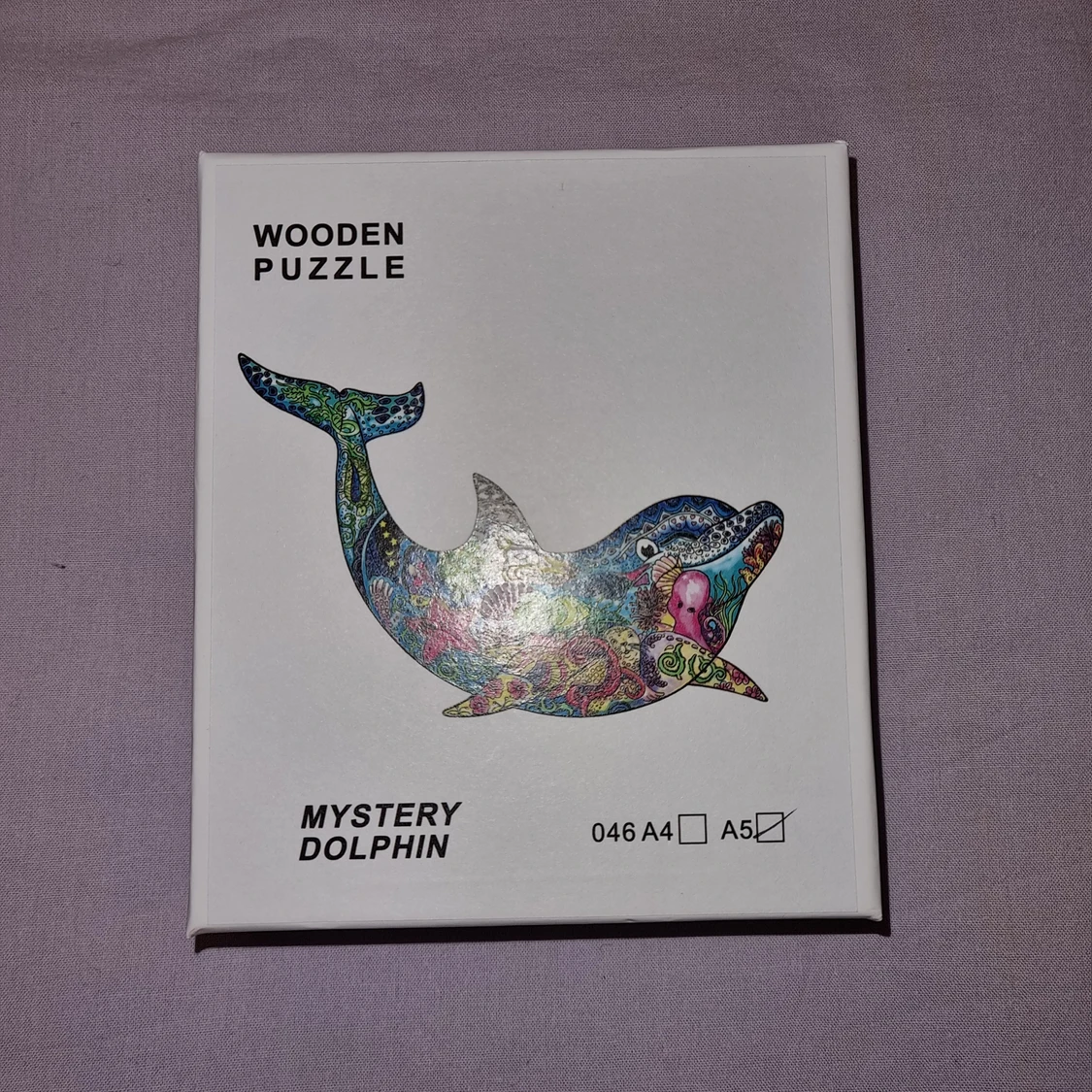 Träpussel delfin