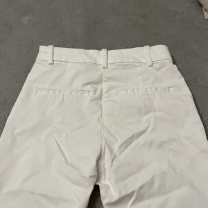 Vita kostymbyxor  - Vita kostymbyxor som inte kommer till användning av mig längre