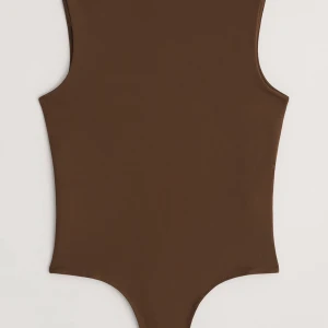 Brun body - Brun body, använd 1-2 gånger  Nypris 269kr  Passar bra både till vardag och fest! 