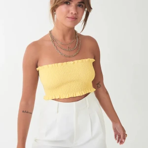 Gul tube top - Gul Gina tricot tube top. Nästan ny. 