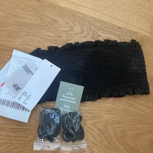 Bikini topp  - Jättefin bikinitopp med små volanger, ej använd, ej provad. Säljer pga köpt fel storlek, 