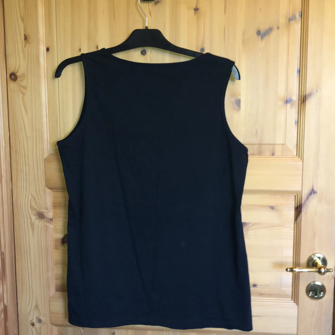 Tufft svart linne i stl L - 90