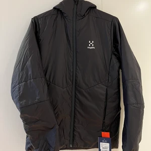 Haglöfs jacka - Haglöfs herrjacka. Helt ny och oanvänd med prislapp kvar på.  Storlek S Nypris 1900kr