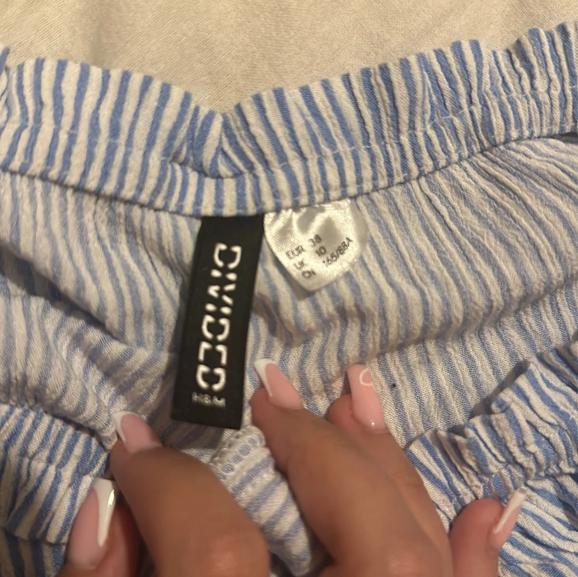 Randig blus från Divided - 91