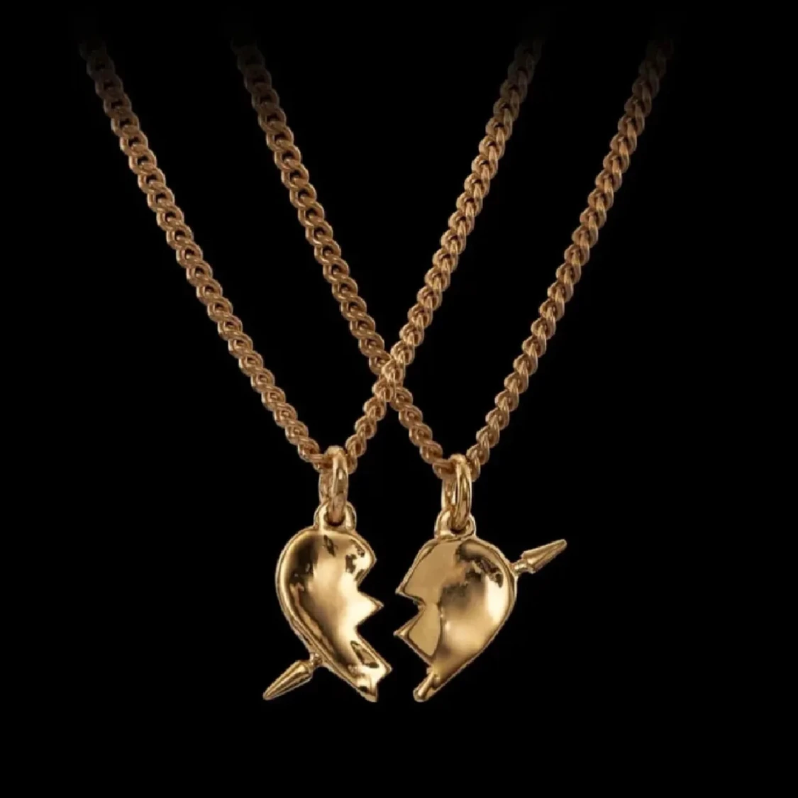 Guldhalsband med delat hjärta