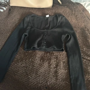 Svart topp - Använt en gång är som ny