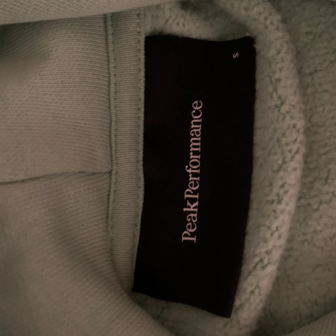 Mintgrön hoodie från Peak Performance - 92