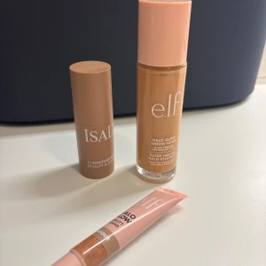 Foundation och contour stick från e.l.f. och IsaDora - Säljer en flytande foundation från e.l.f. med glow-effekt  (Shade 5, Medium tan) använd ca 2 gånger, och ett contour stick från IsaDora (färg 34, dark almound) använd ca 2 gånger. Sedan e.l.f halo glow contour i färgen light/medium som är använd ca 2 gånger. 