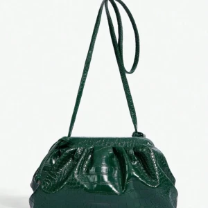 Grön axelväska - Ena spännet av, fungerar som vanligt (öppna & stänga osv) bara att man inte kan bära lika tunga saker. Går säkert enkelt att fixa om man har nått hemma. 