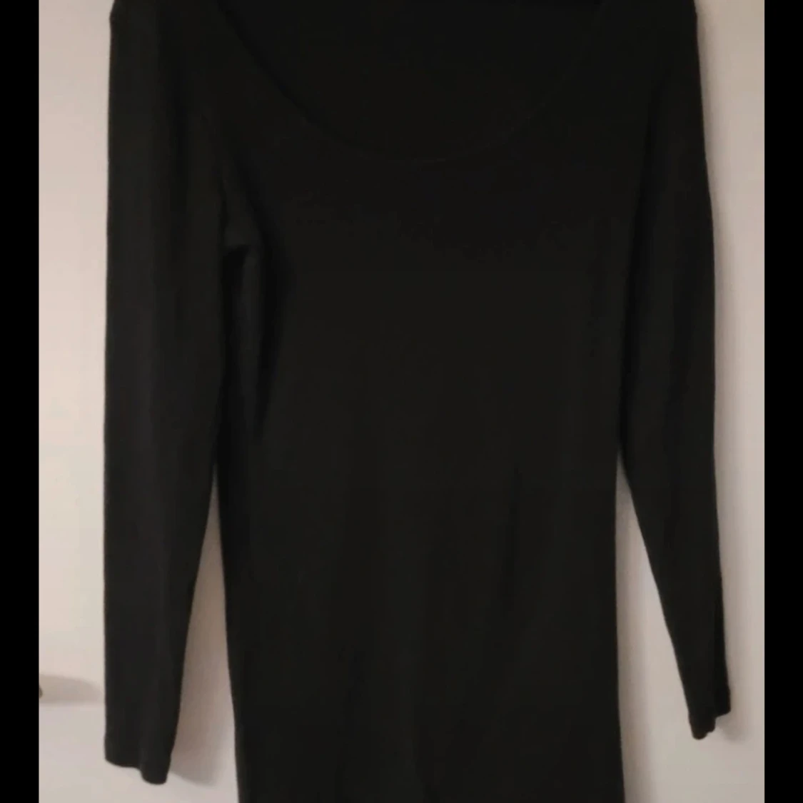 Svart långärmad klänning