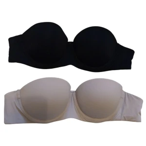 Strapless bh 2st - 2st bh:ar, den svarta har band som kan fästas på. Köpta på lindex, nypris: 600kr för båda.