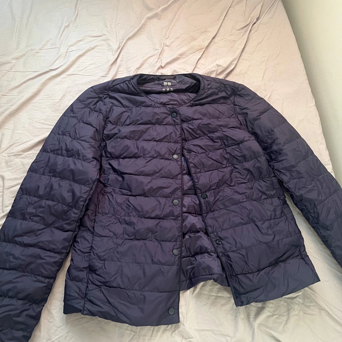 Mörkblå uniqlo jacka  - 90