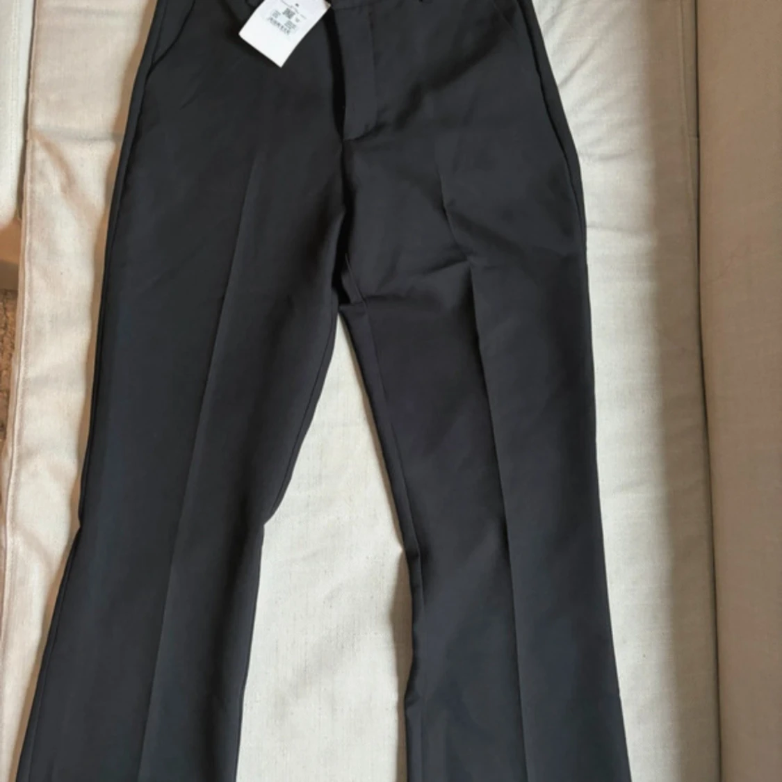 Svarta kostymbyxor