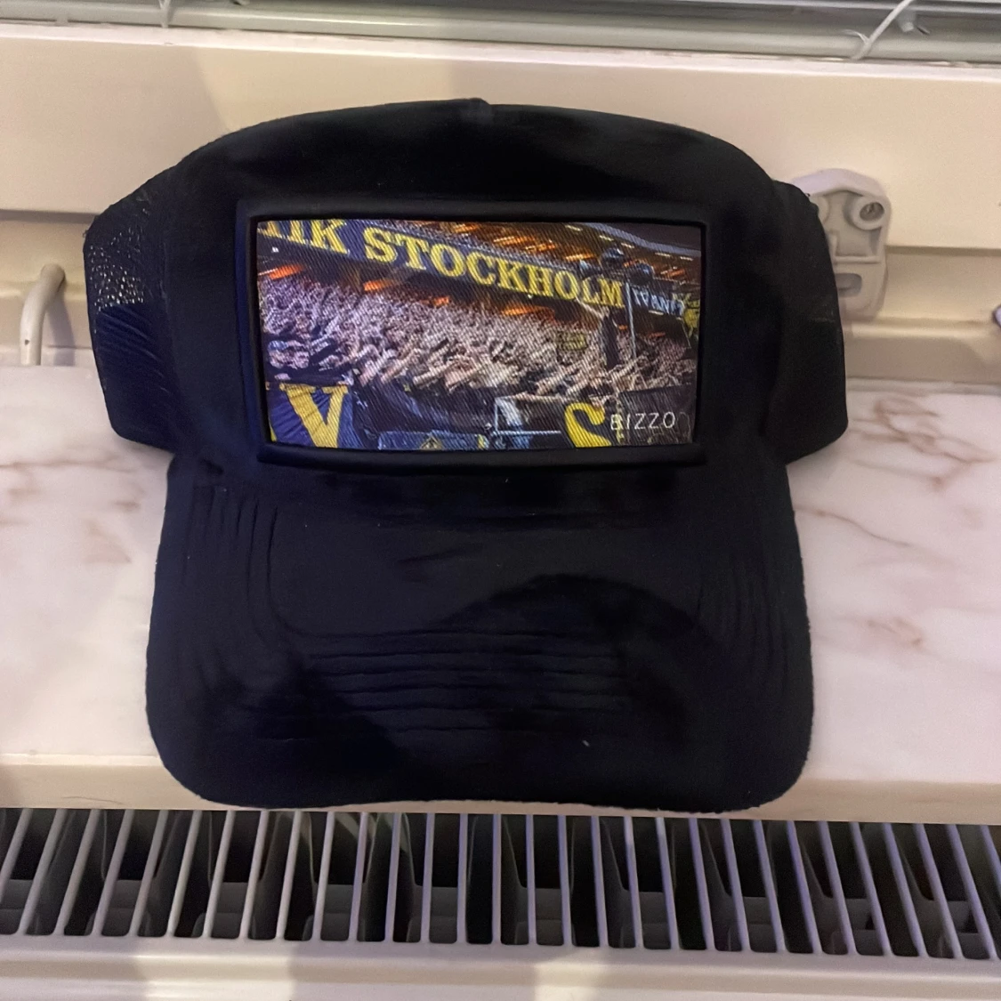 Svart keps med AIK Stockholm motiv