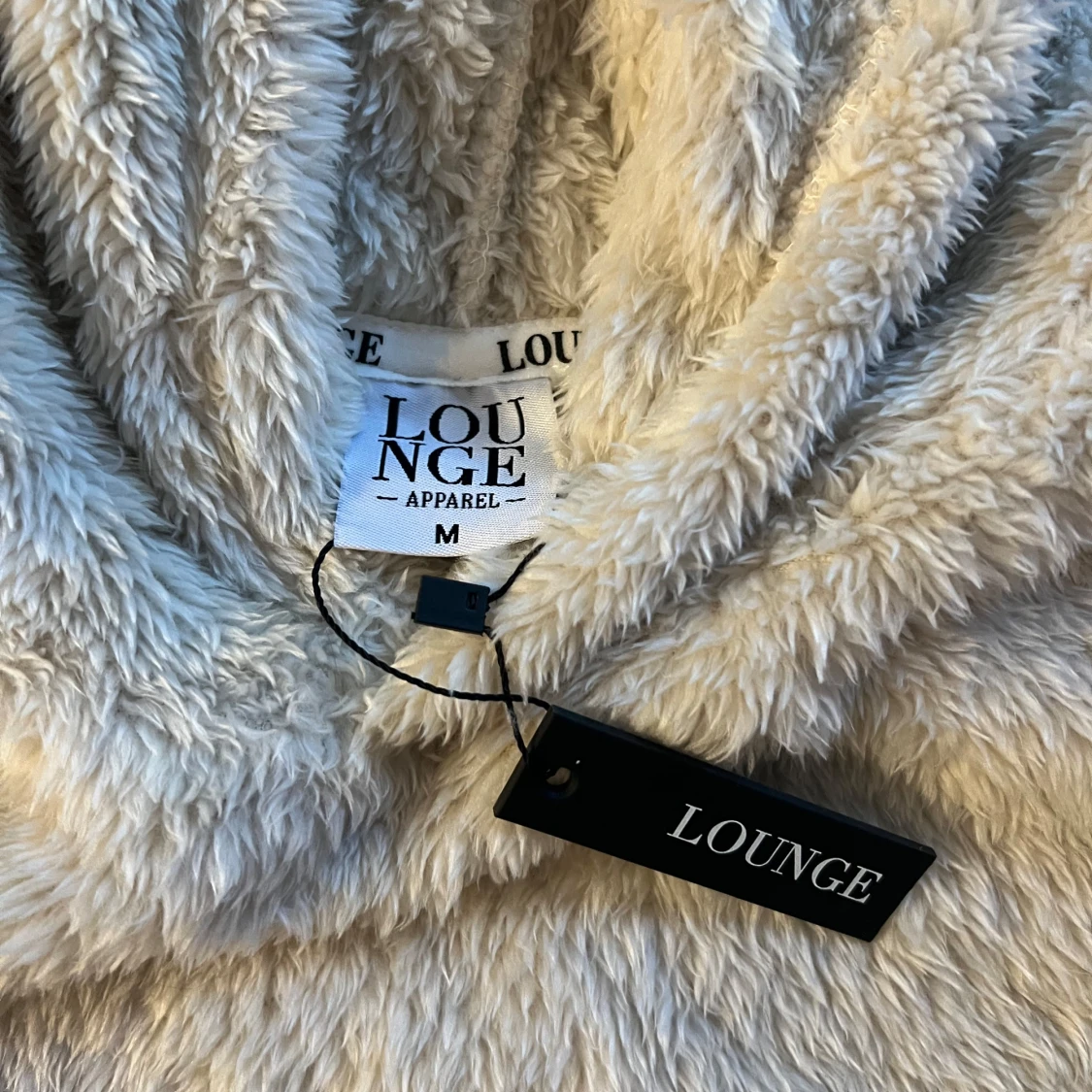 Beige fluffig hoodie från Lounge - 91