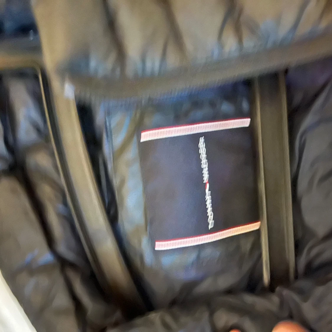 Svart quiltad dunväst från Tommy Hilfiger - 1