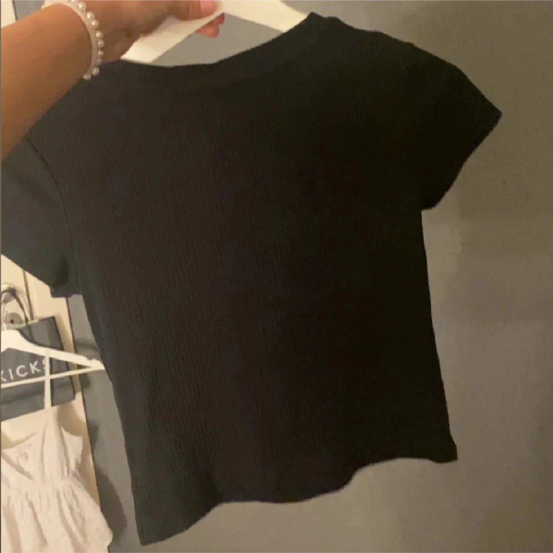 Svart ribbad topp från H&M - 1