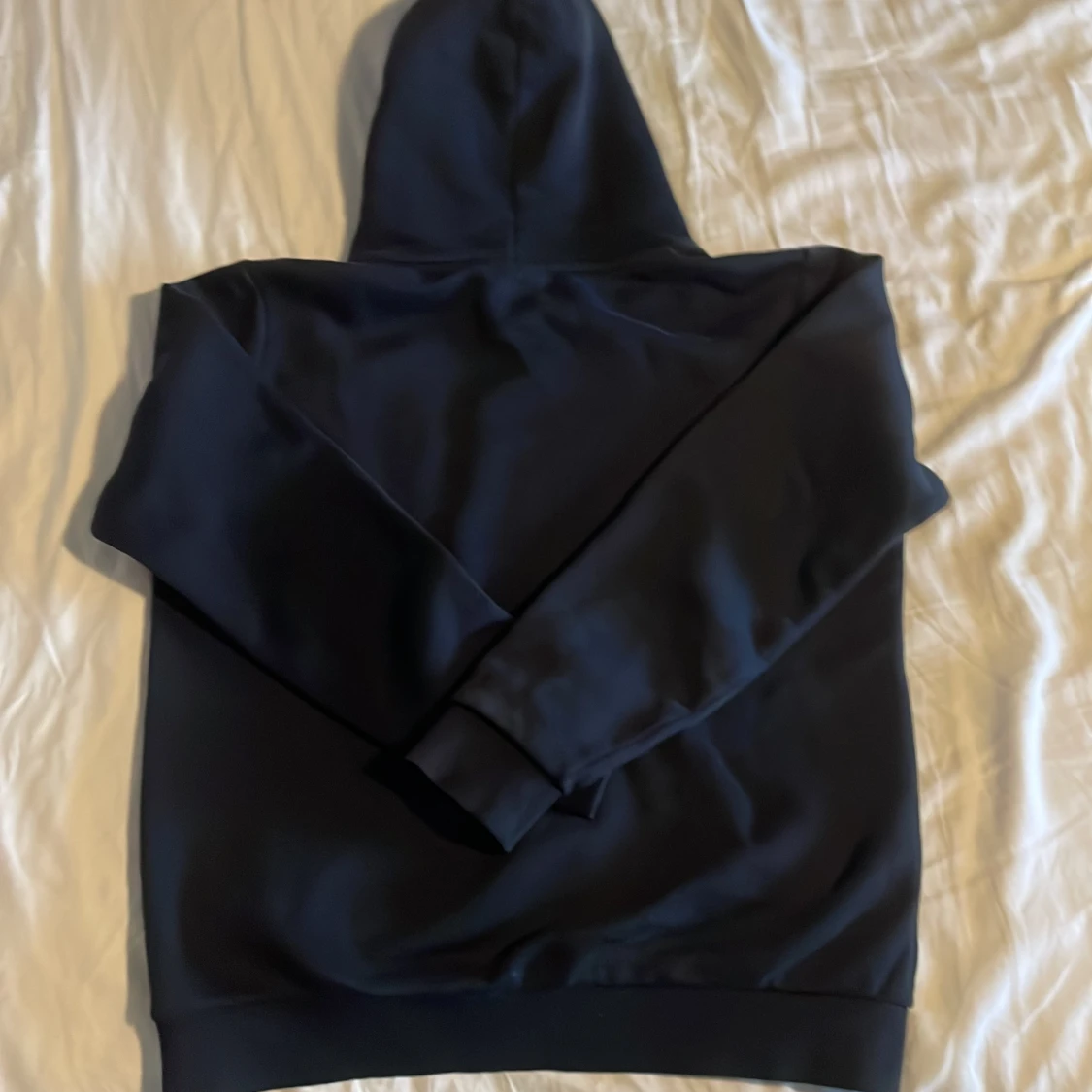 Svart hoodie från Peak Performance - 1