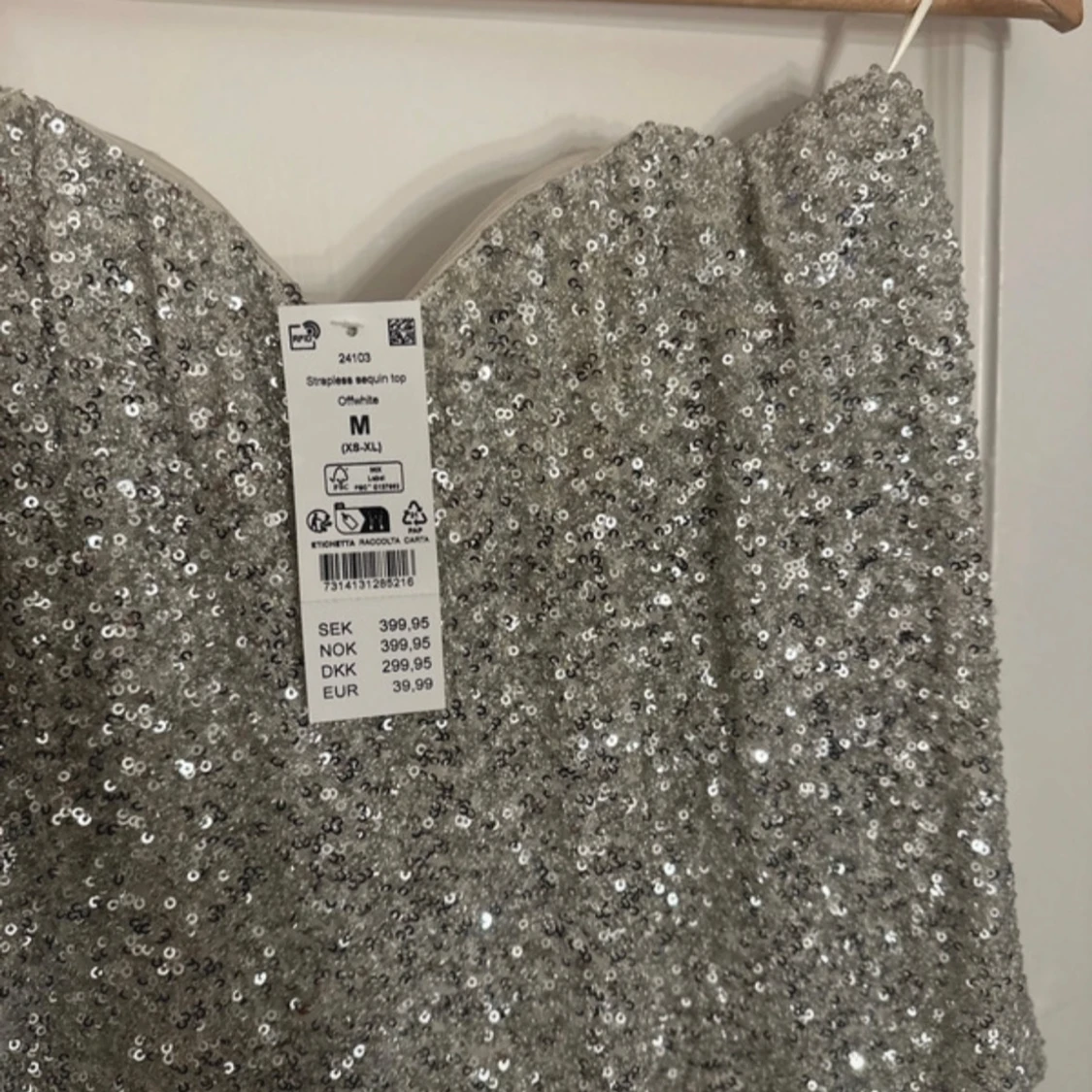 Glittrig topp ifrån Gina - 1