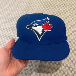 Blå keps från New Era - Blue jays new era keps storlek 7 (55.8cm)