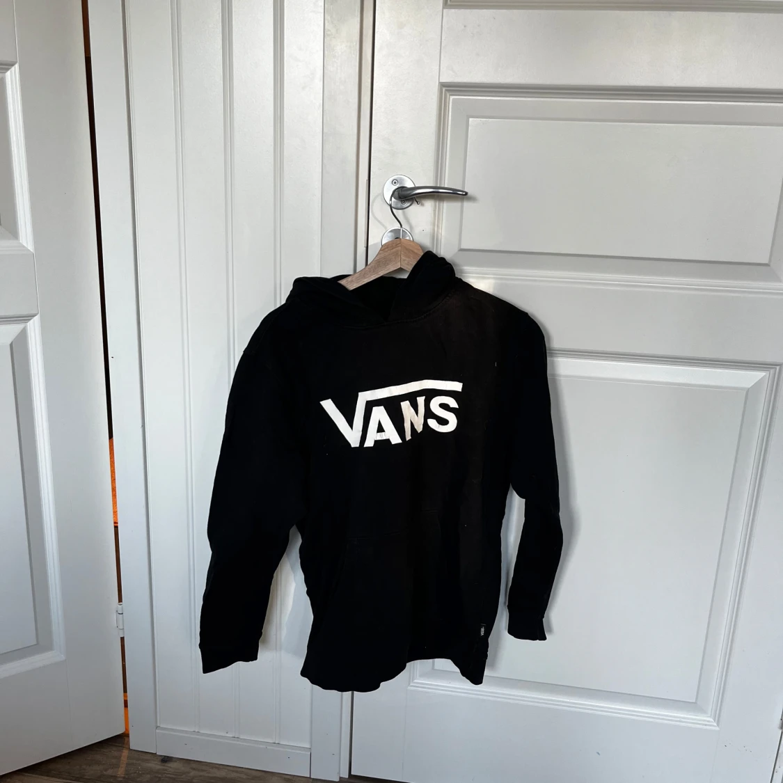 Svart hoodie från Vans