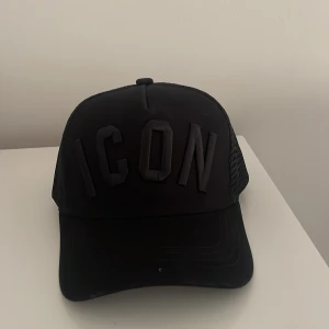 Icon keps - Svart icon keps helt o använd !Äkta!