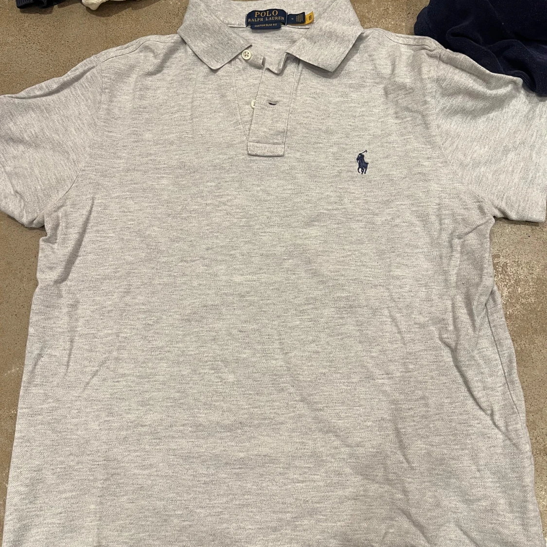 Grå pikétröja från Ralph Lauren