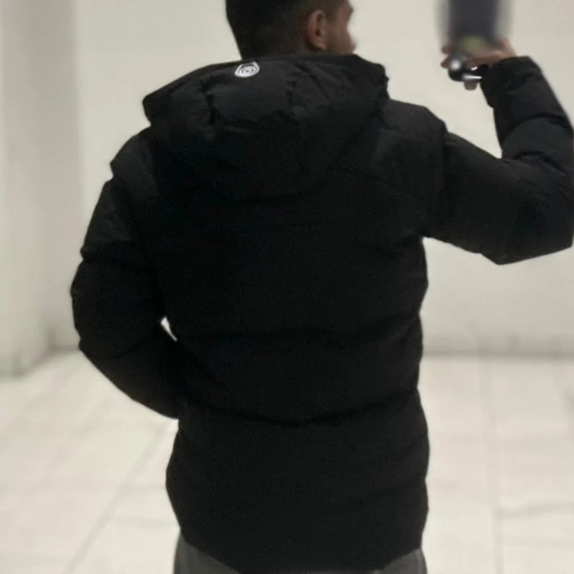 Svart dunjacka från Sail Racing - 90