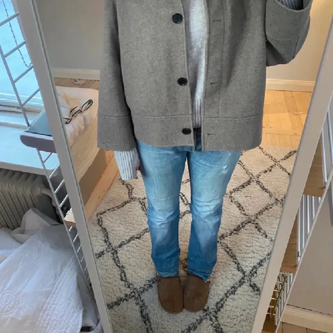 Beige kappa med knappar