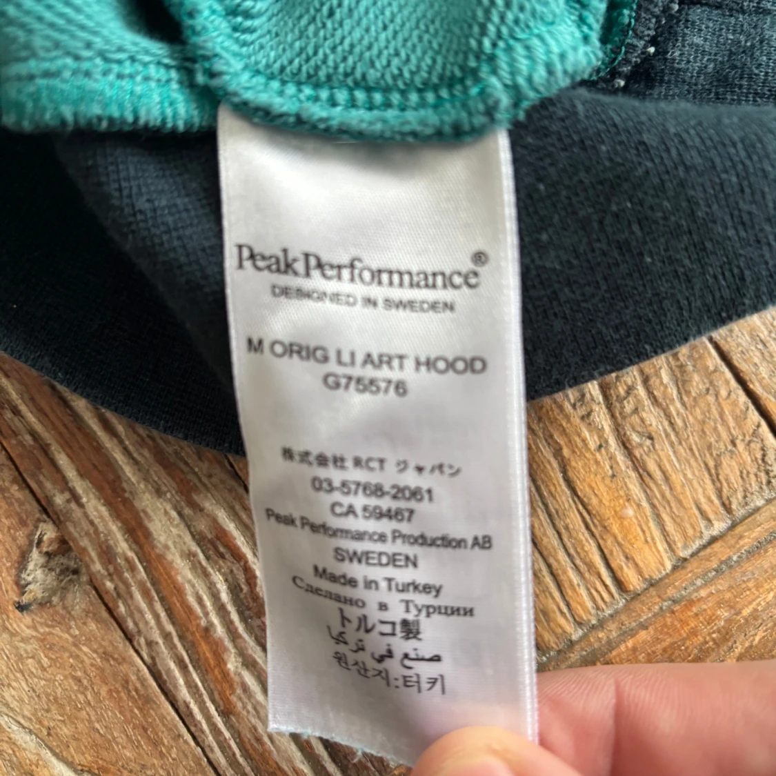 Grön hoodie från Peak Performance - 93